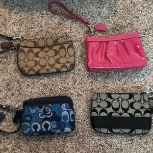 4 Coach wristlets